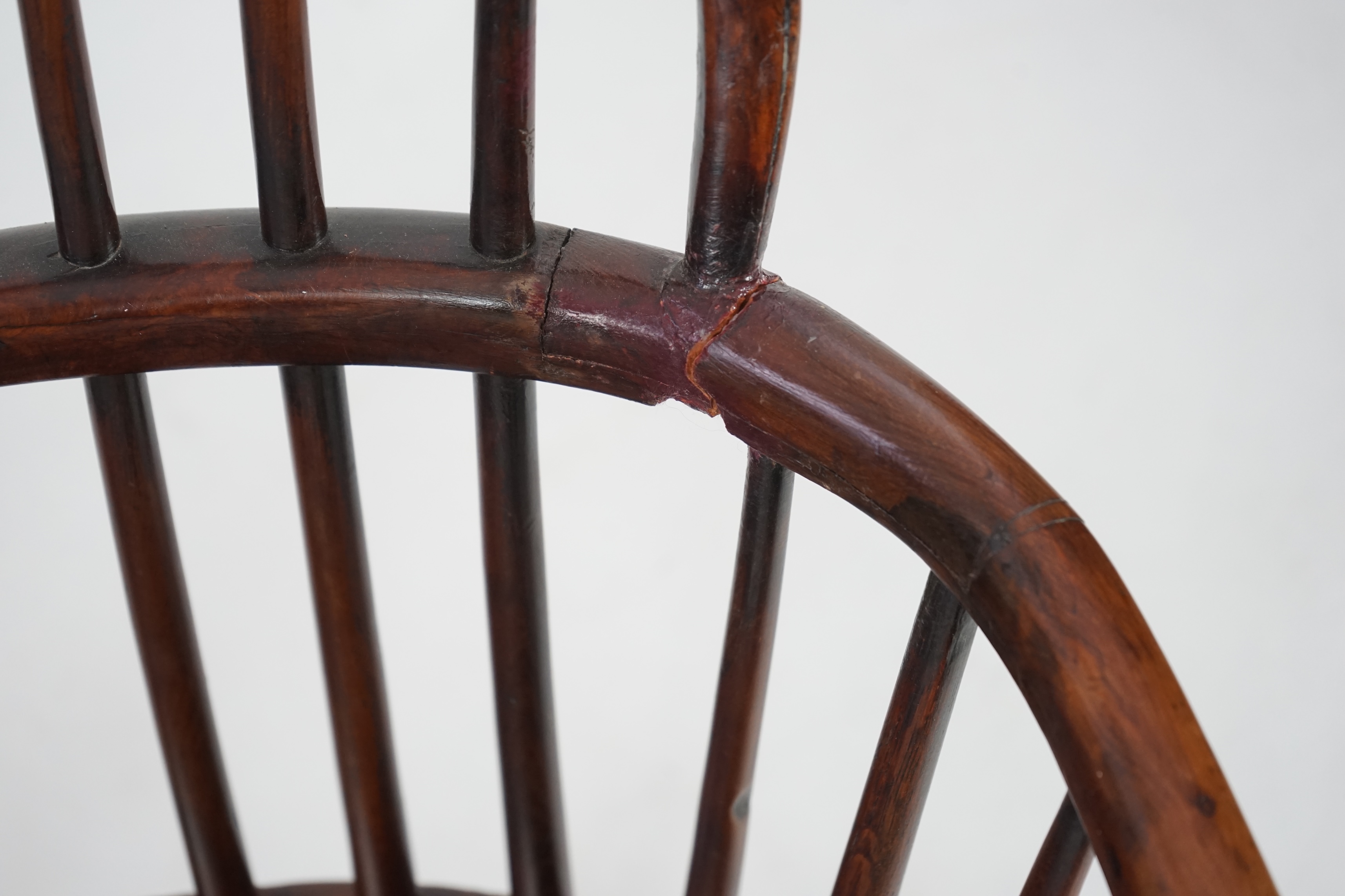 A mid 19th century yew, elm and ash Windsor chair